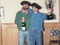 Jugadores del campeonato intersociedades de mus con sus trofeos