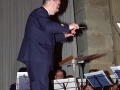 Director de la banda de música en un concierto ofrecido en el auditorium de la Iglesia de Santa Ana