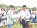 Entrega de un premio a un pastor