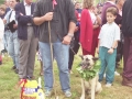 Pastor y perro premiados