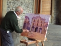 Pintor pintando un cuadro al óleo
