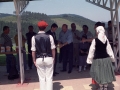 Actos de inauguración de las instalaciones de tiro al plato : dantzaris frente a Eli Galdos cortando la cinta