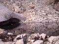 Mendizaleak Estany de RiuMalo ondoan atsedena hartzen, Aran bailaran