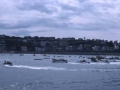 Llegada de las traineras a la bahía donostiarra, desde el Paseo Nuevo