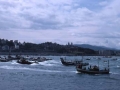 Llegada de las traineras a la bahía donostiarra, desde el Paseo Nuevo