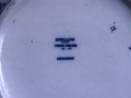 Zeramikazko objektu baten inskripzioa ´Swallow. Cetruria-England. Wedgweon´-rekin