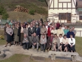 Grupo de quintos nacidos en el año 1929, delante de la sociedad Larrain-gain