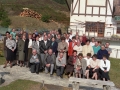 Grupo de quintos nacidos en el año 1929, delante de la sociedad Larrain-gain
